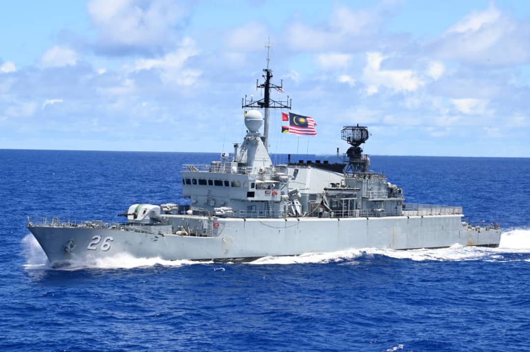 MULTINATIONAL GROUP SAIL SHIPS WORKING TOGETHER IN THE PACIFIC OCEAN